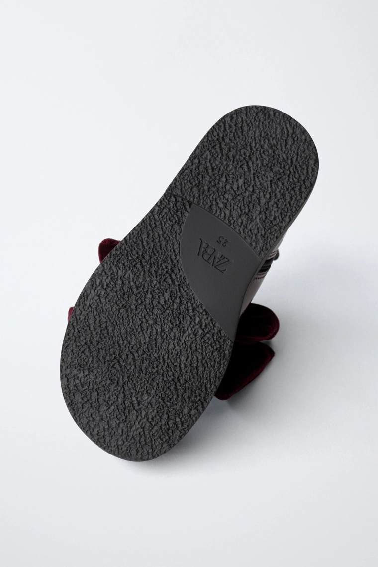 Лаковые ботильоны с бантом