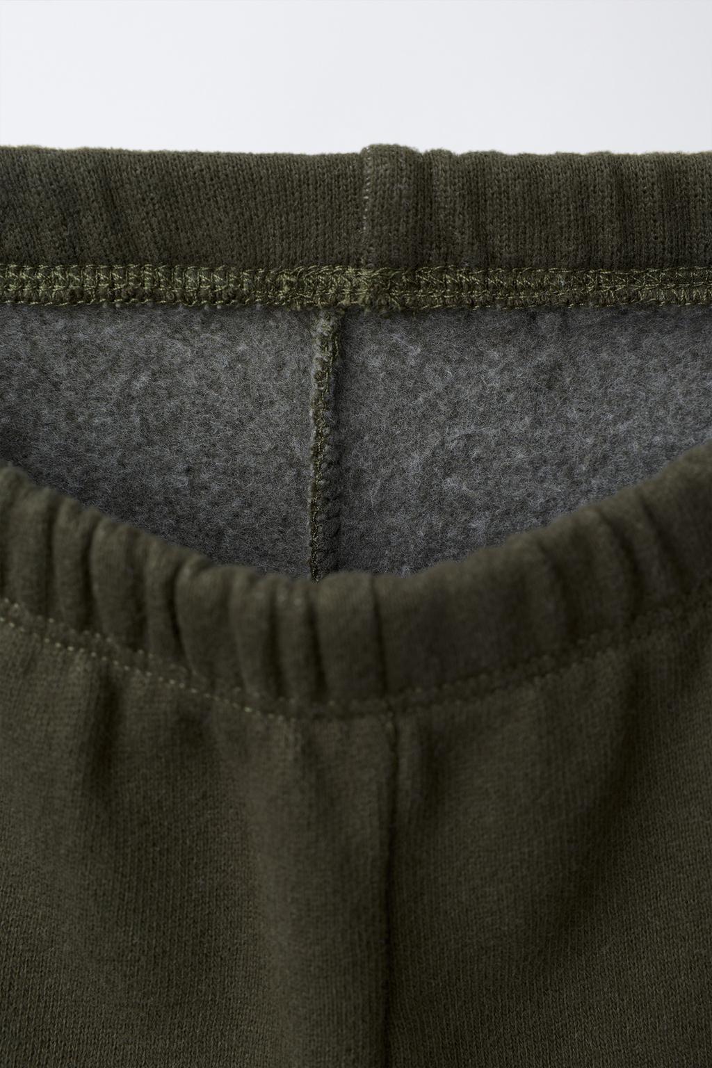 БРЮКИ-ДЖОГГЕРЫ С ЭТИКЕТКОЙ