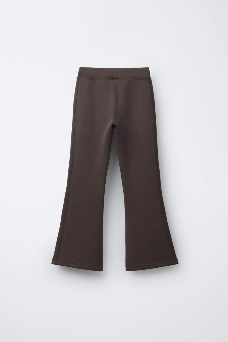 Брюки спортивного покроя с расклешенными штанинами