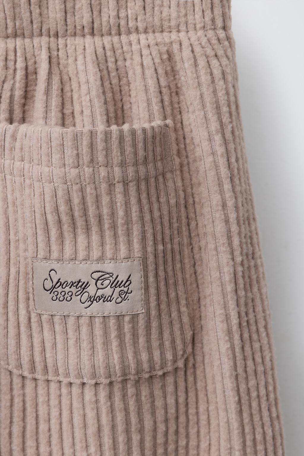 БРЮКИ В РУБЧИК ИЗ МЯГКОЙ ТКАНИ