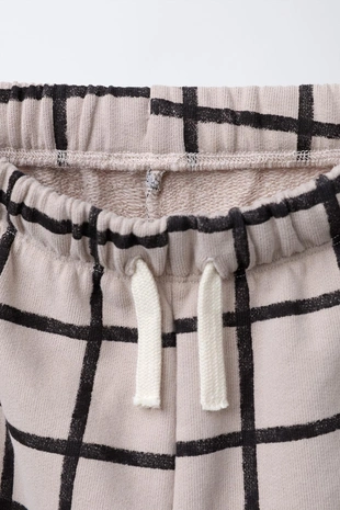 Брюки BAGGY из футера в клетку- Заказать в России