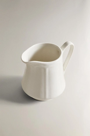 Кувшин из фарфора с рельефным узором- Заказать в России