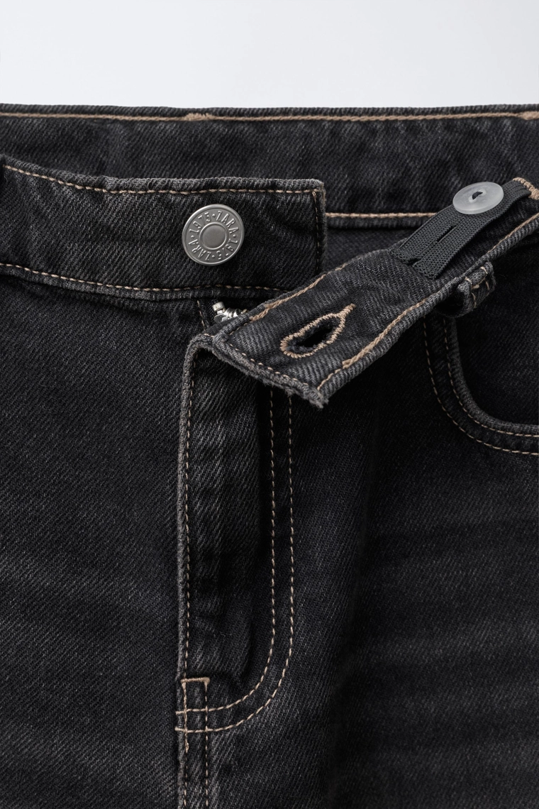 Джинсы с запачканым эффектом свободного кроя