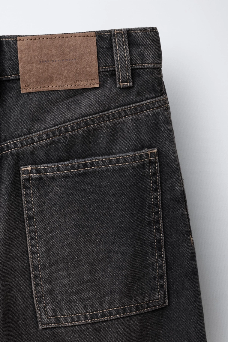 Джинсы с запачканым эффектом свободного кроя