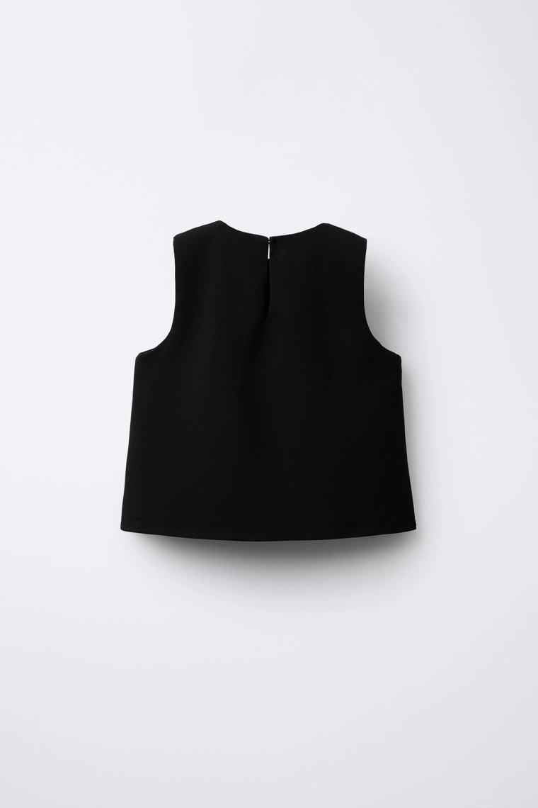 Топ с бантом и бисером