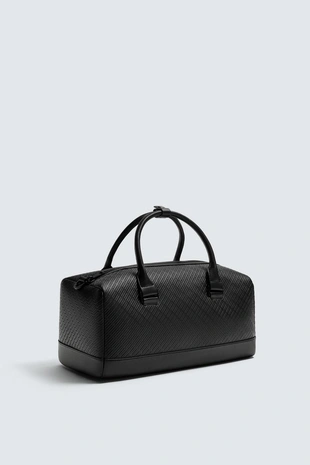 Прорезиненная сумка из рельефной ткани- Заказать в России