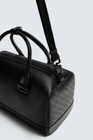 Прорезиненная сумка из рельефной ткани- Заказать в России