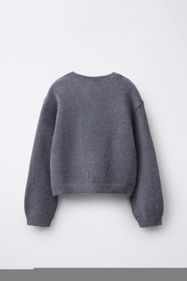 Кардиган с аппликациями в виде блестящих бантов