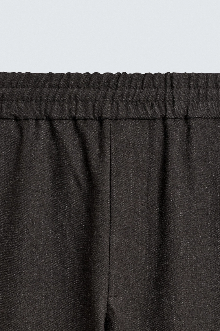 Брюки свободного кроя с текстурой