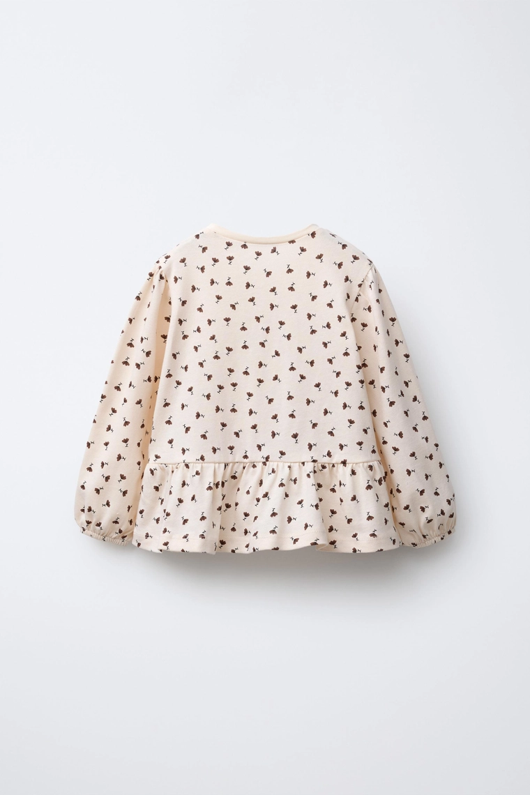 Футболка с цветочным принтом и бантом из вельвета