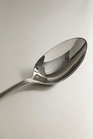 Блестящая стальная ложка- Заказать в России