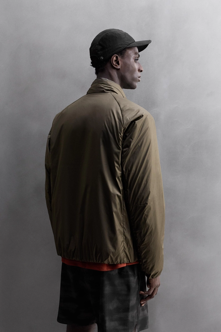 Спортивный пуховик running down blend