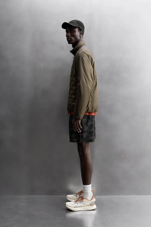 Стеганая куртка с наполнителем из пуха для бега- Заказать в России