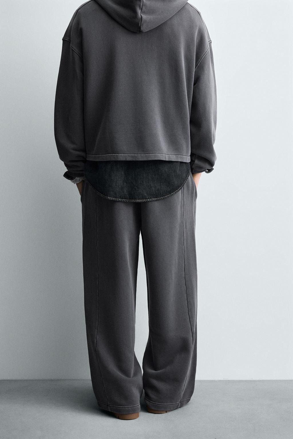 ДЖОГГЕРЫ WIDE FIT С ЭФФЕКТОМ ПОТЕРТОСТИ