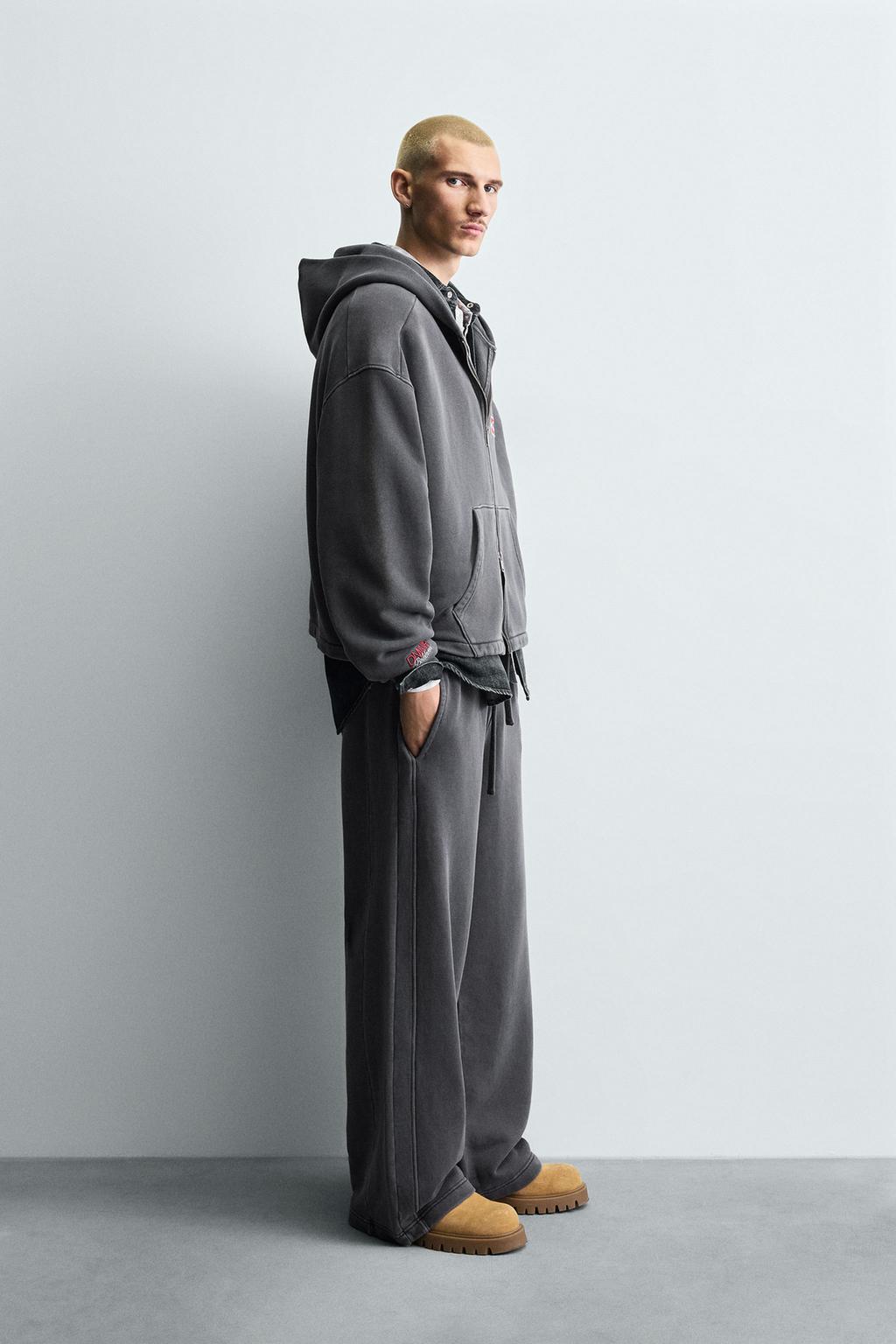 ДЖОГГЕРЫ WIDE FIT С ЭФФЕКТОМ ПОТЕРТОСТИ