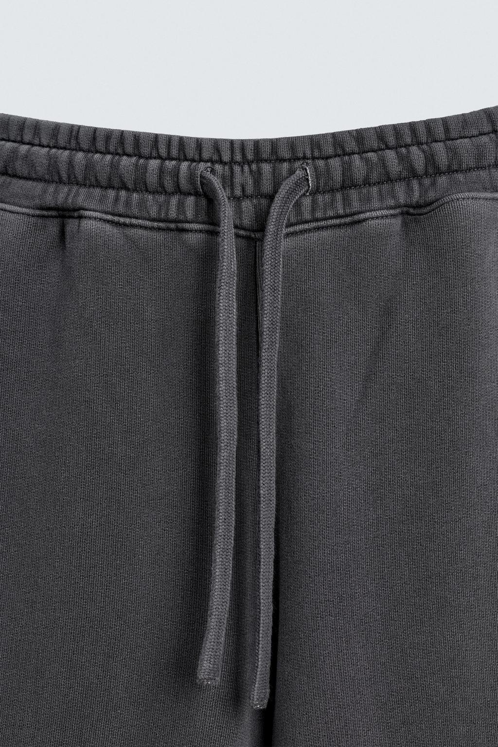 ДЖОГГЕРЫ WIDE FIT С ЭФФЕКТОМ ПОТЕРТОСТИ