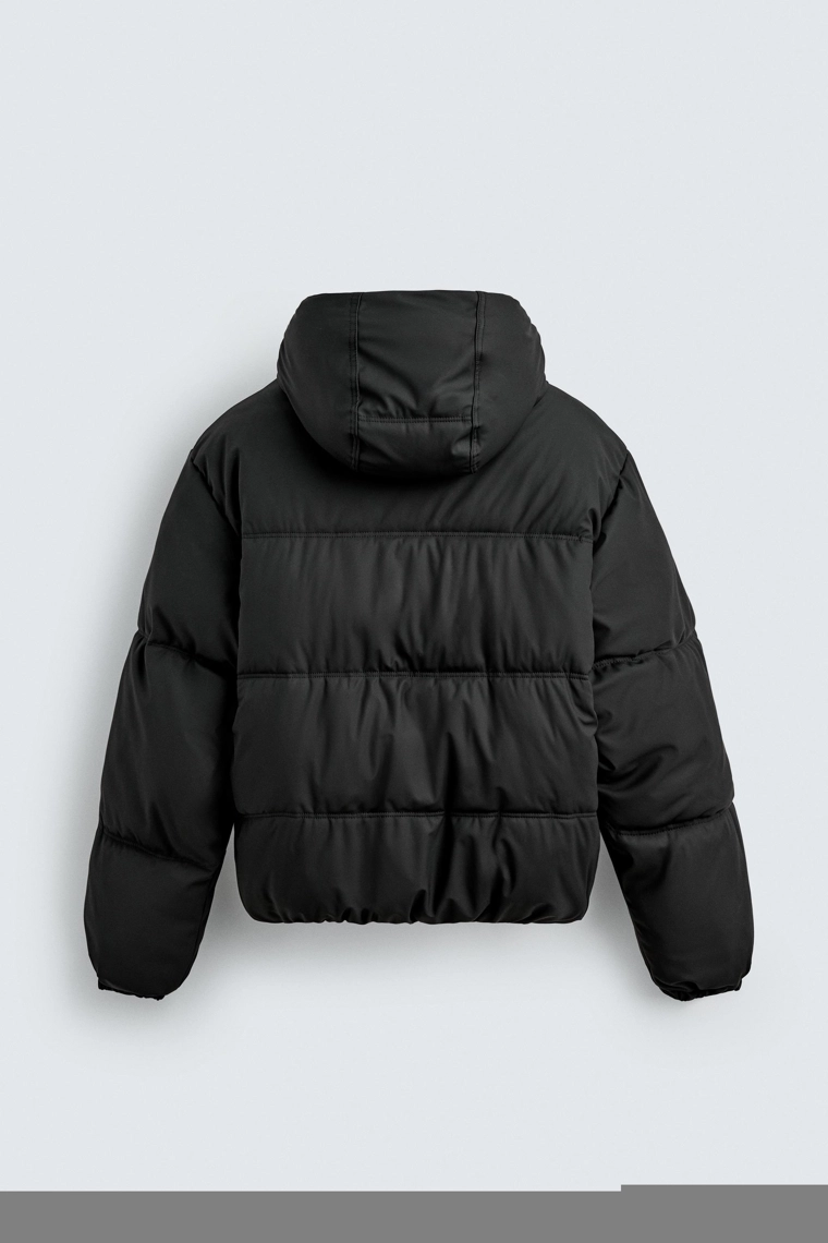 Пуховик с контрастной резиновой отделкой