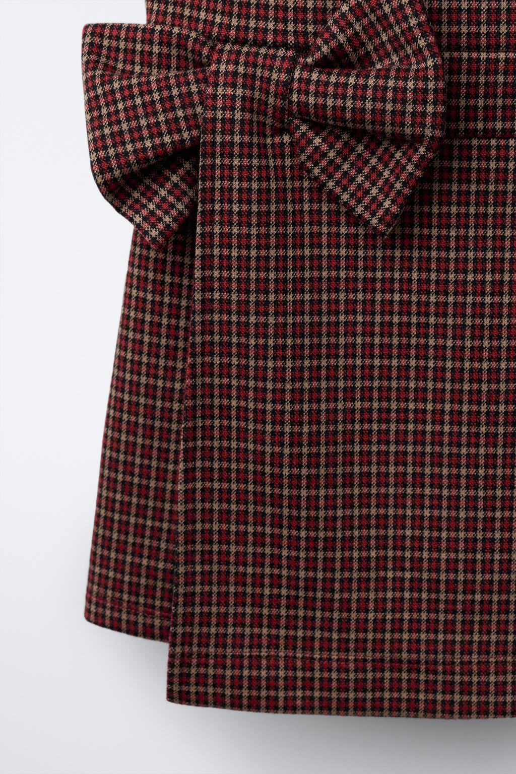 КОРОТКИЙ КОМБИНЕЗОН В КЛЕТКУ С БАНТОМ