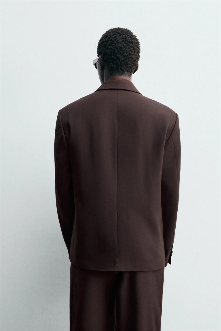 Шерстяной пиджак с двубортной застежкой