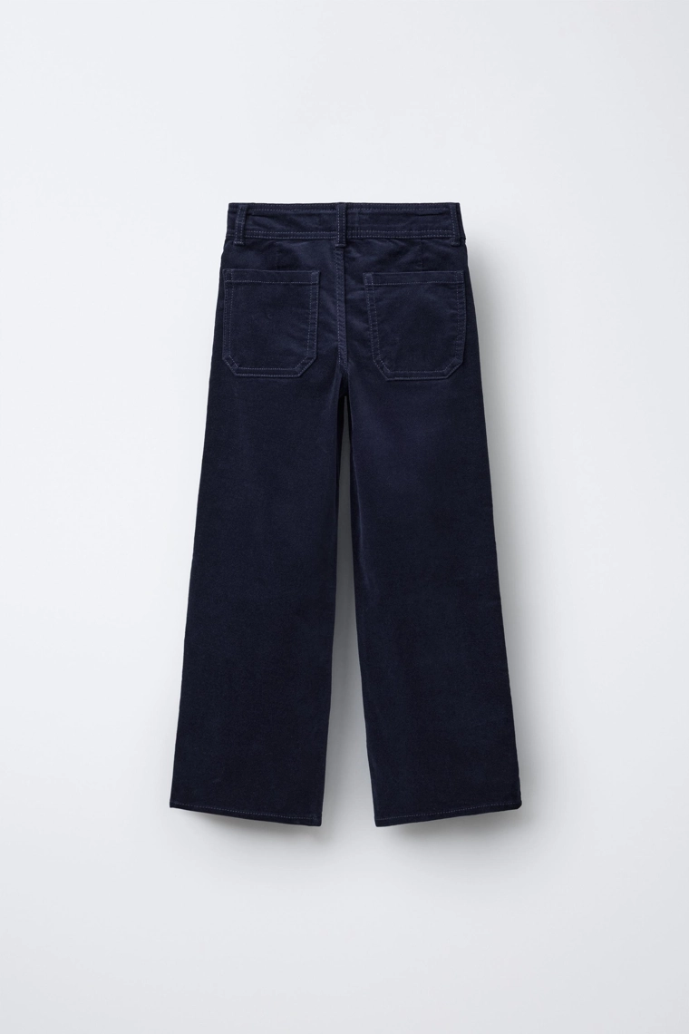 Брюки из велюра с вышитыми цветами