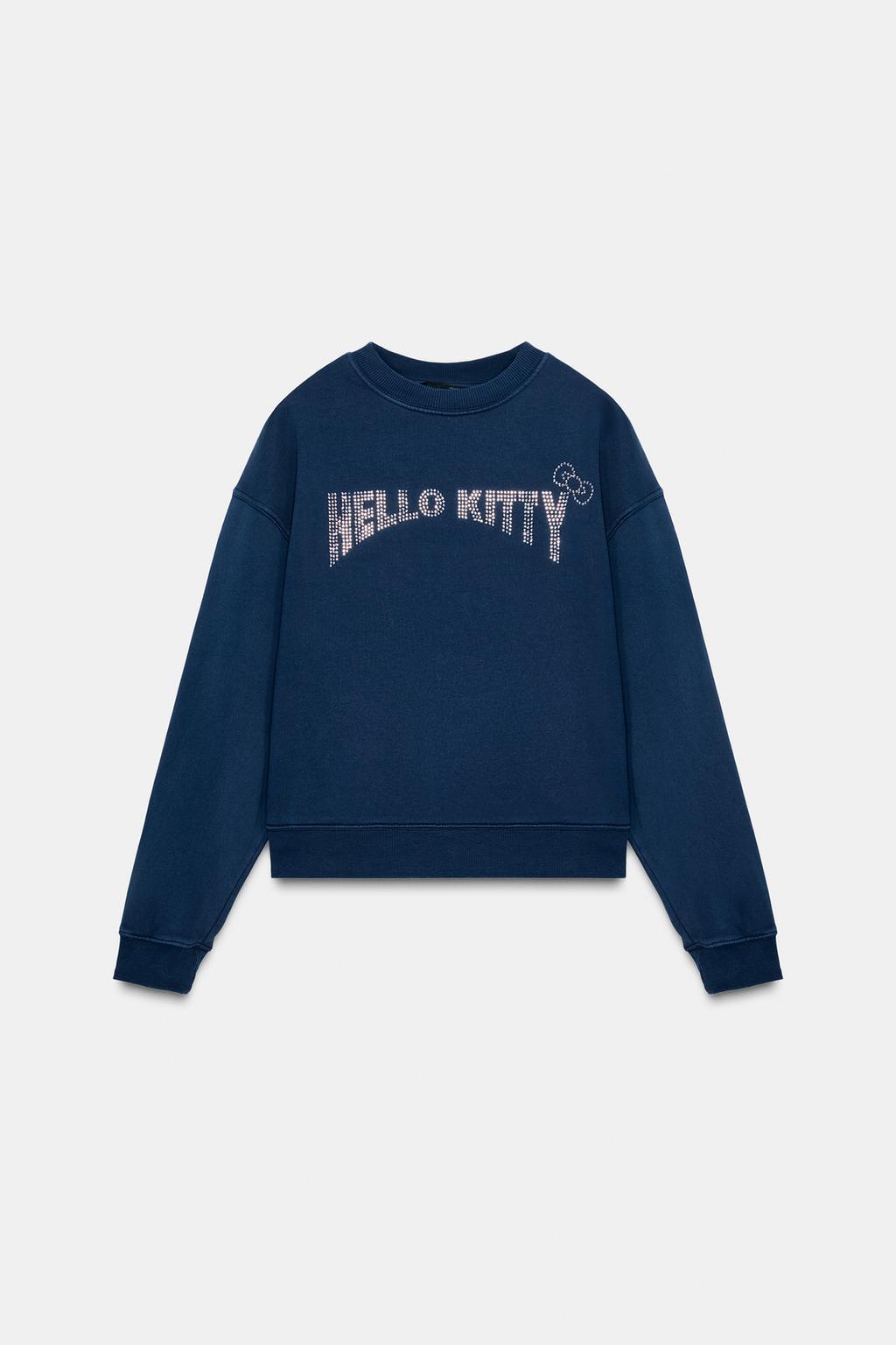 ТОЛСТОВКА HELLO KITTY © 2025 SANRIO С ЭФФЕКТОМ ПОТЕРТОСТИ