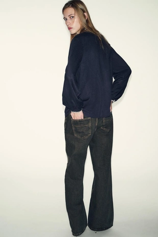 Блуза с бантом и контрастной отстрочкой- Заказать в России