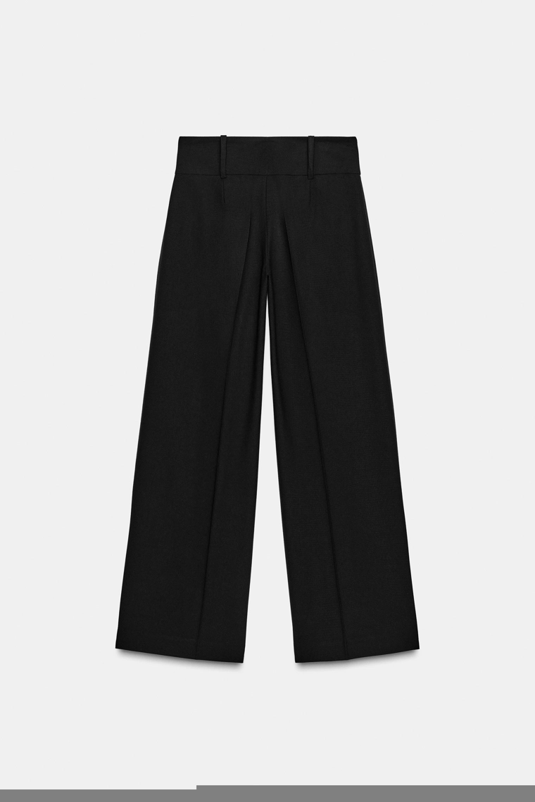 Брюки с карманами на молнии