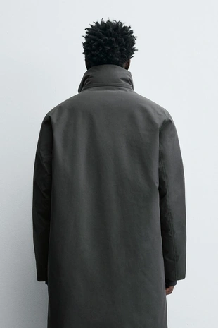 Длинный стеганый пуховик- Заказать в России