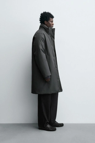 Длинный стеганый пуховик- Заказать в России