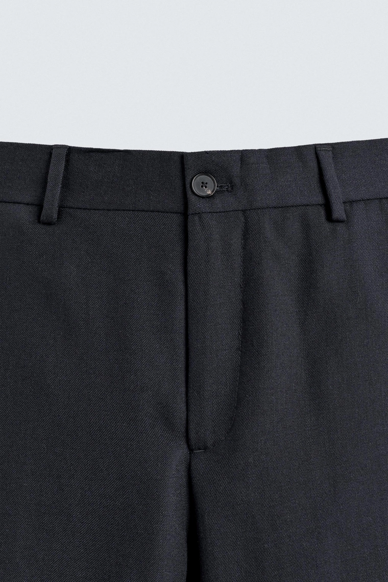 Шерстяные брюки прямого кроя