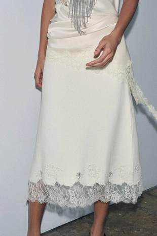 Трикотажная юбка миди с бусинами и кружевом- Заказать в России