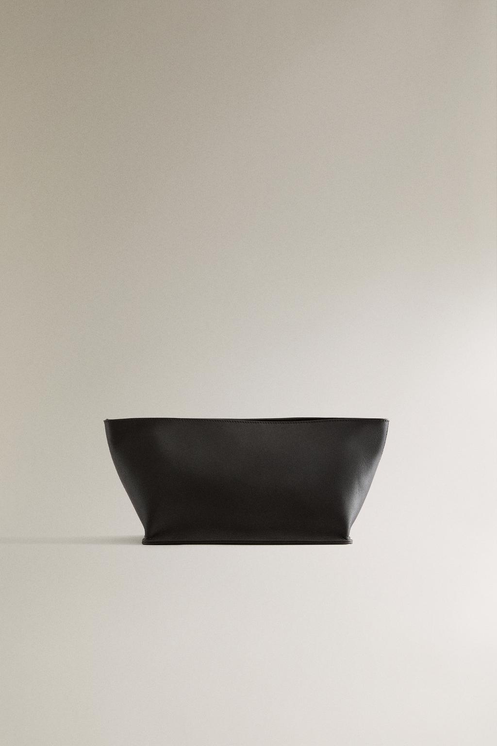 Кожаная сумка для косметики