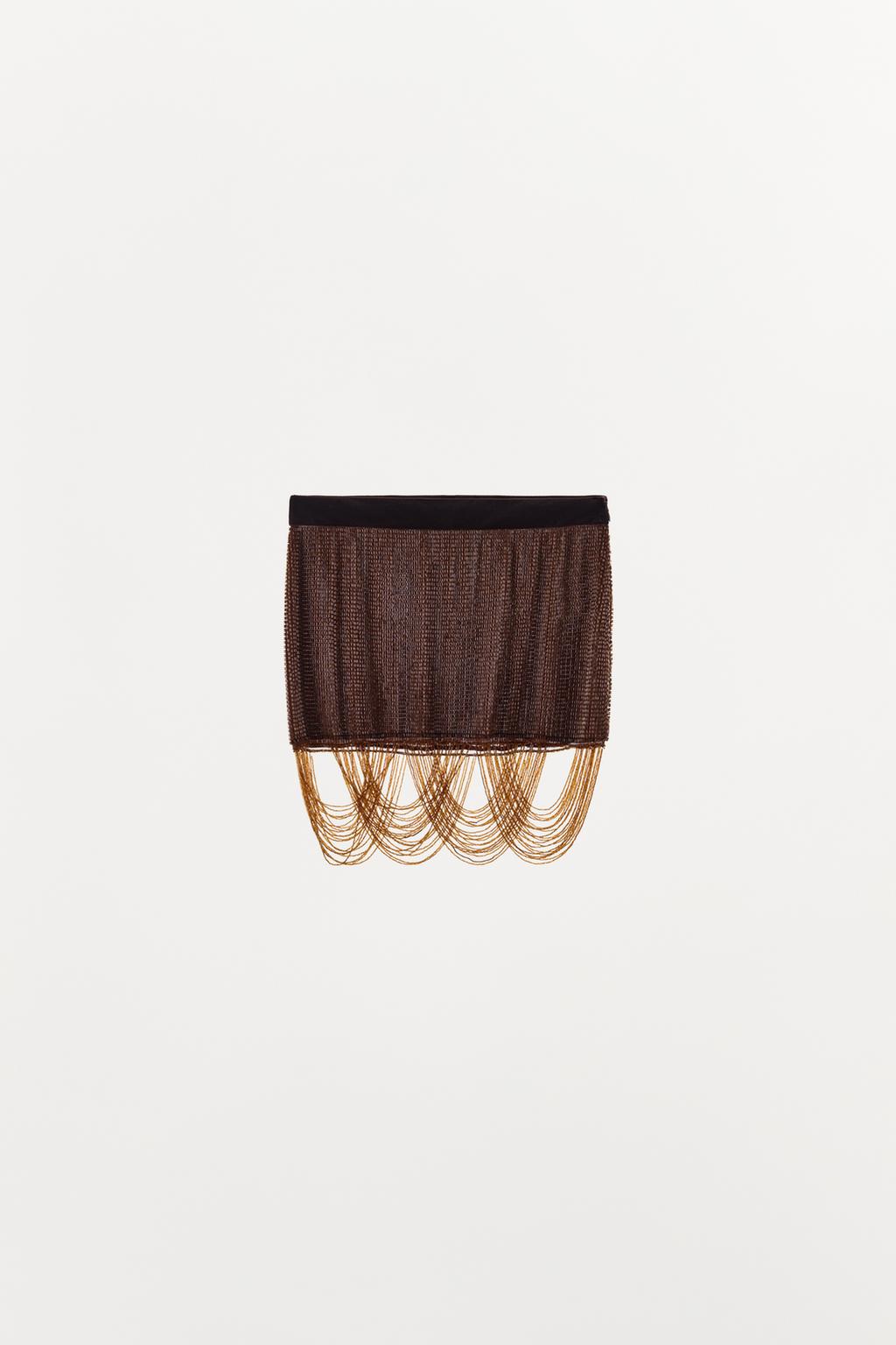 МИНИ-ЮБКА С БУСИНАМИ И БАХРОМОЙ