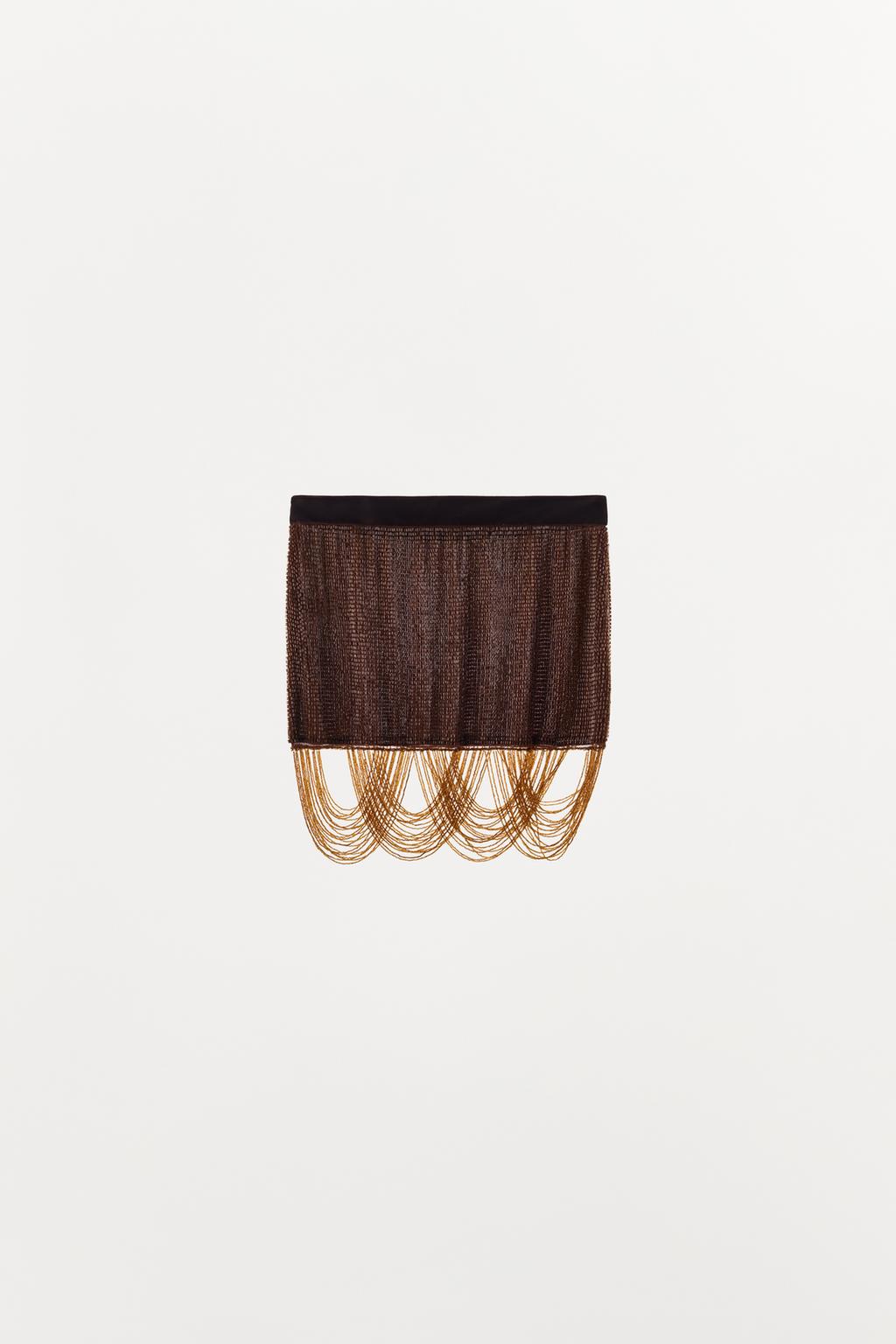 МИНИ-ЮБКА С БУСИНАМИ И БАХРОМОЙ