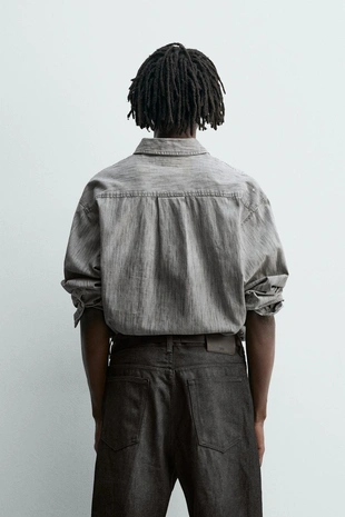 Джинсовая рубашка с эффектом потертости и брызгами- Заказать в России