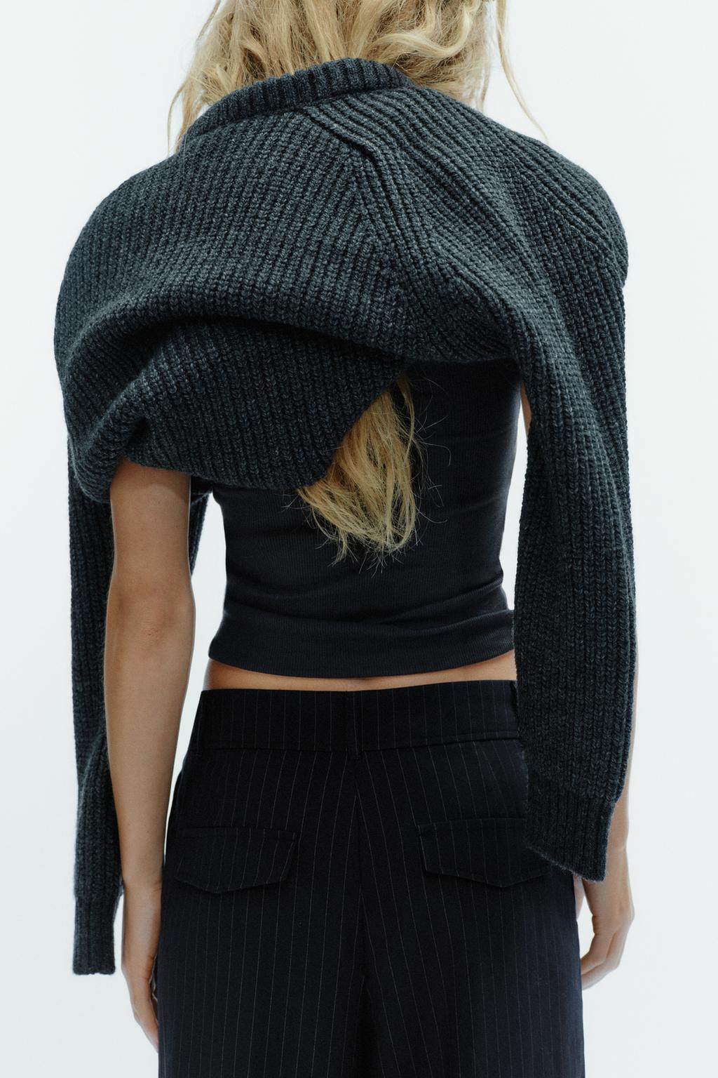 БРЮКИ В ТОНКУЮ ПОЛОСКУ С ЗАЩИПАМИ И КЛАПАНАМИ