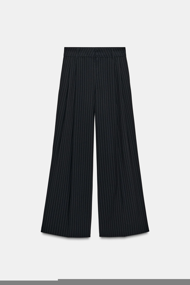 Брюки в полоску с ластиком и клапанами на карманах