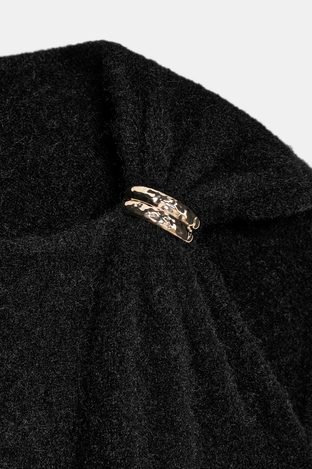 ДЖЕРСИ С БРОШЬЮ И РУКАВАМИ «КРЫЛЫШКО»