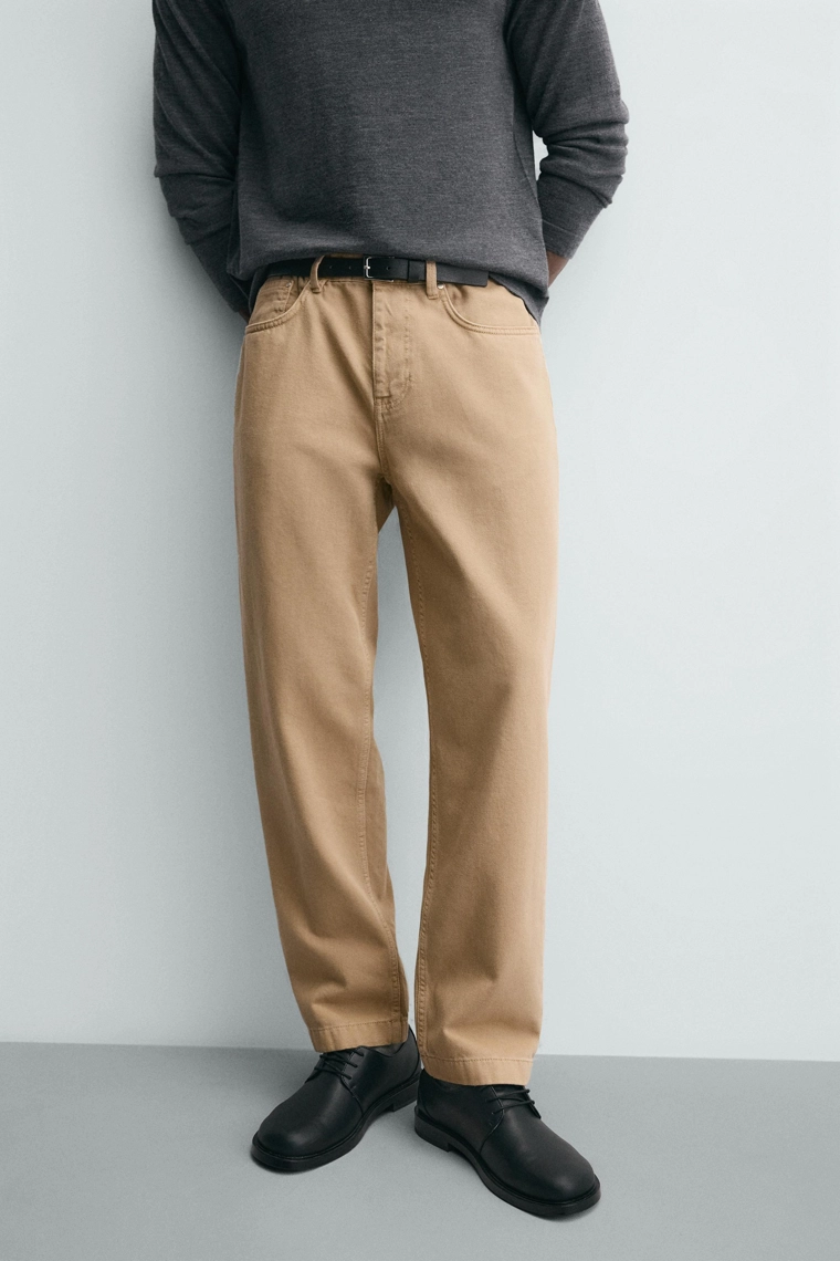 Джинсы регулярного кроя в стиле потертостей