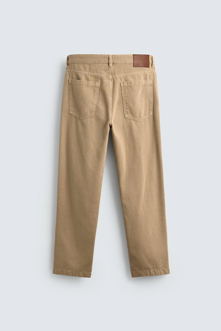 Джинсы регулярного кроя в стиле потертостей