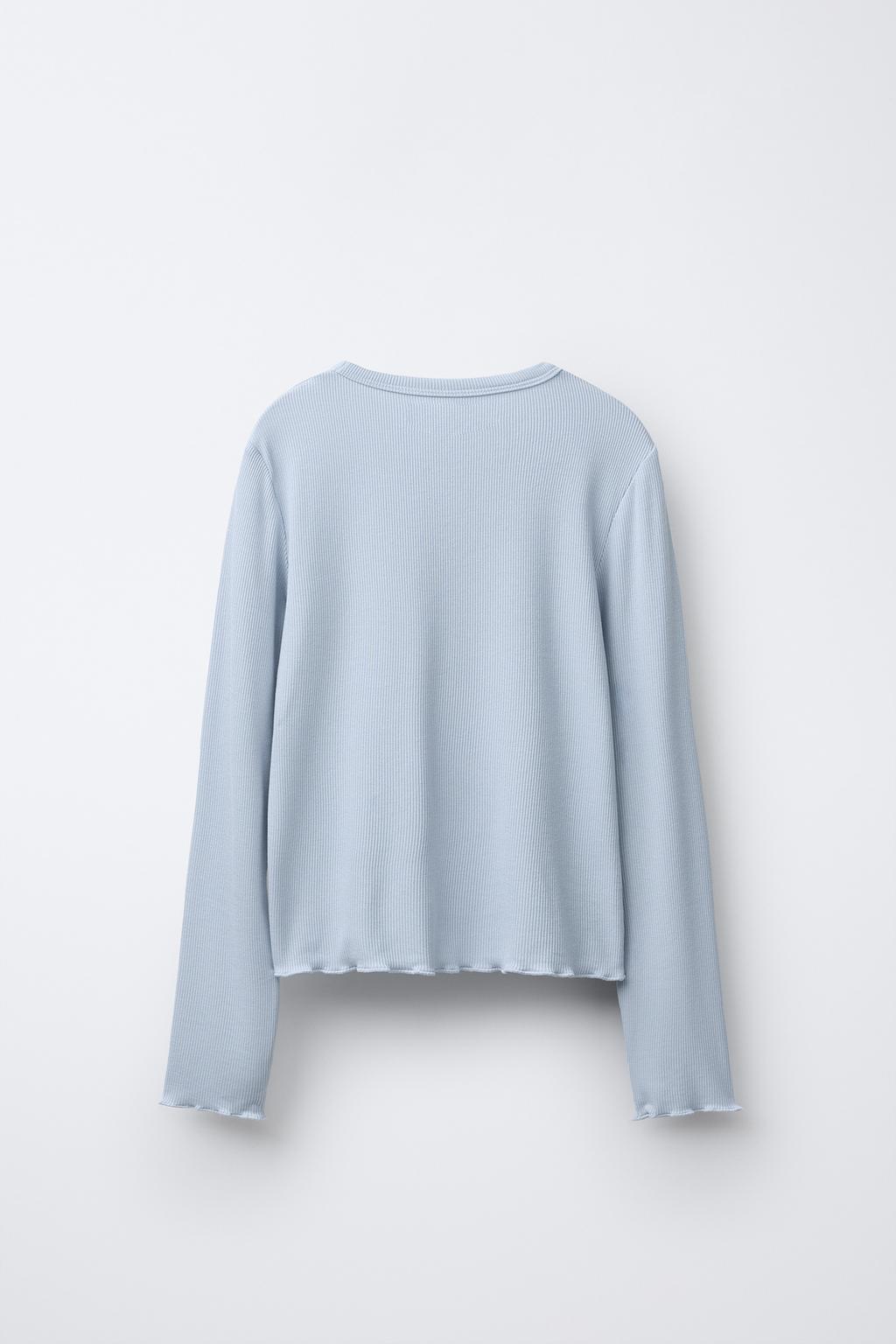 ФУТБОЛКА В РУБЧИК С ПАЙЕТКАМИ