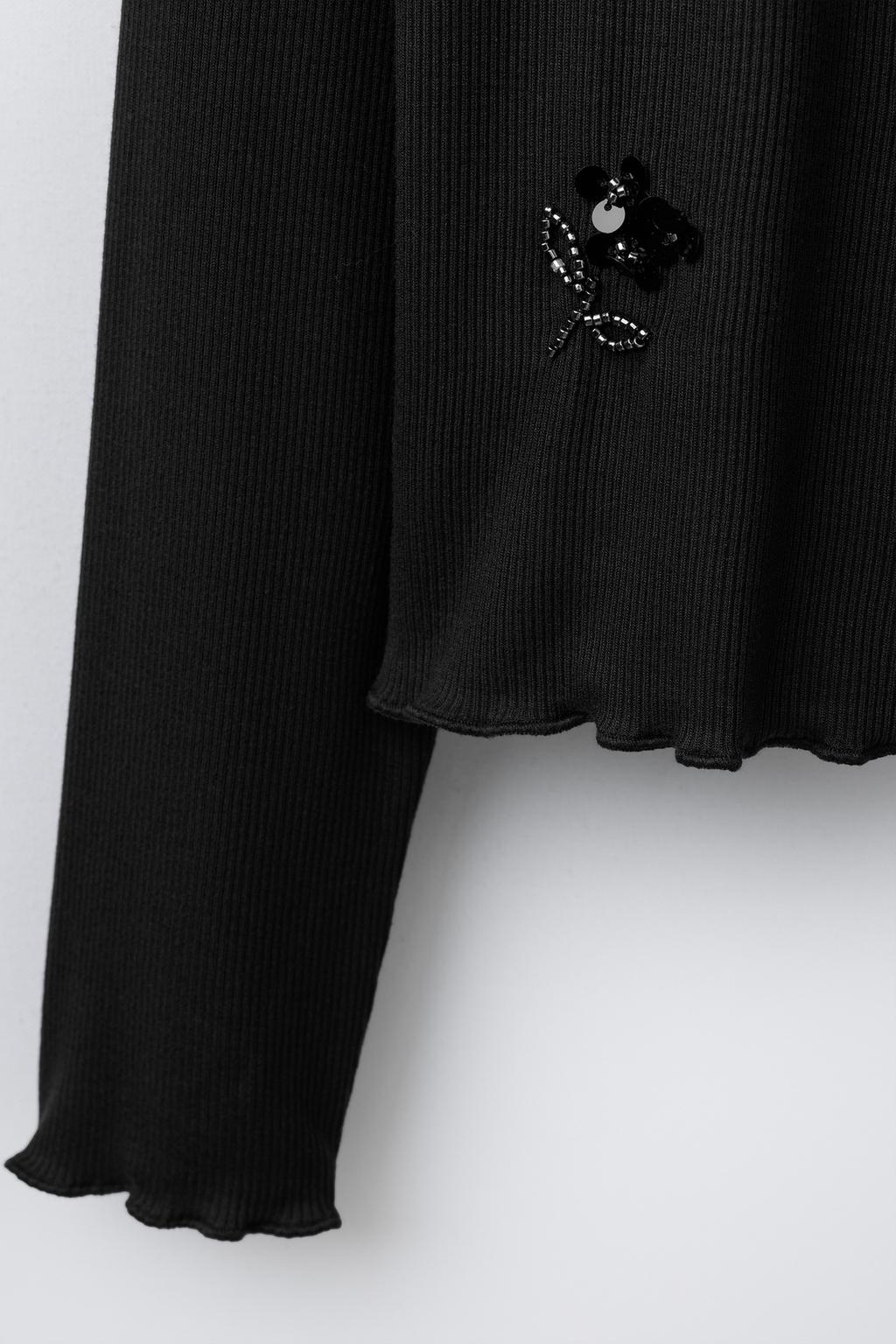 ФУТБОЛКА В РУБЧИК С ПАЙЕТКАМИ