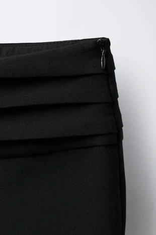 Брюки FLARE с заклепками- Заказать в России