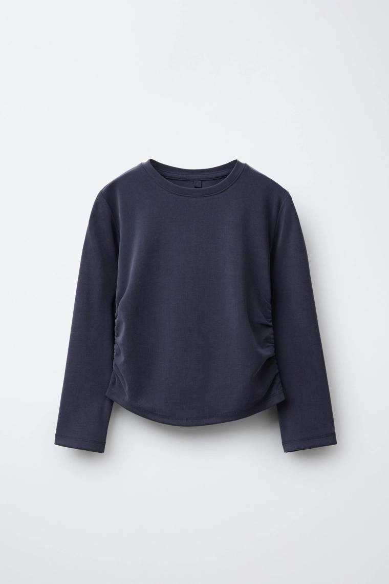 Спортивная футболка с рюшами