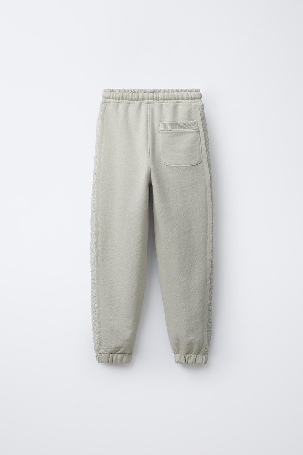 БРЮКИ-ДЖОГГЕРЫ ИЗ КОМБИНИРОВАННОЙ ТКАНИ