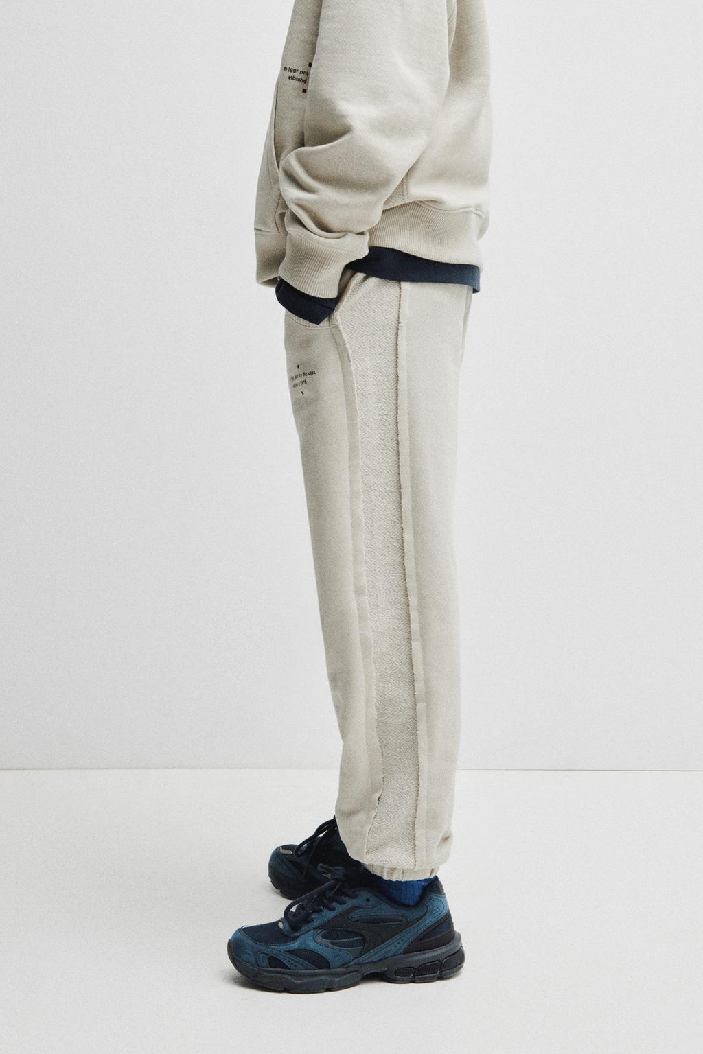 БРЮКИ-ДЖОГГЕРЫ ИЗ КОМБИНИРОВАННОЙ ТКАНИ