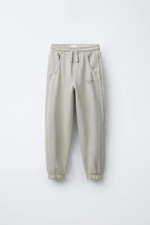 Брюки-джоггеры из комбинированной ткани- Заказать в России