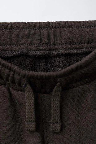 Комбинированные брюки-джоггеры из мягкой ткани- Заказать в России