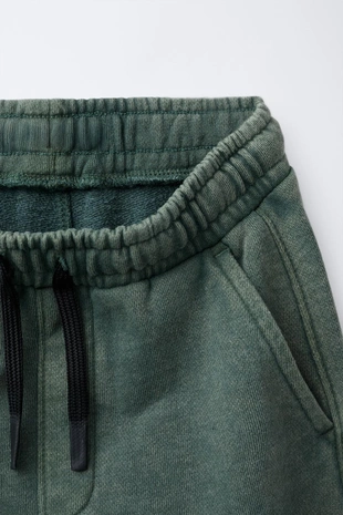 Брюки BALLOON с эффектом потертости- Заказать в России