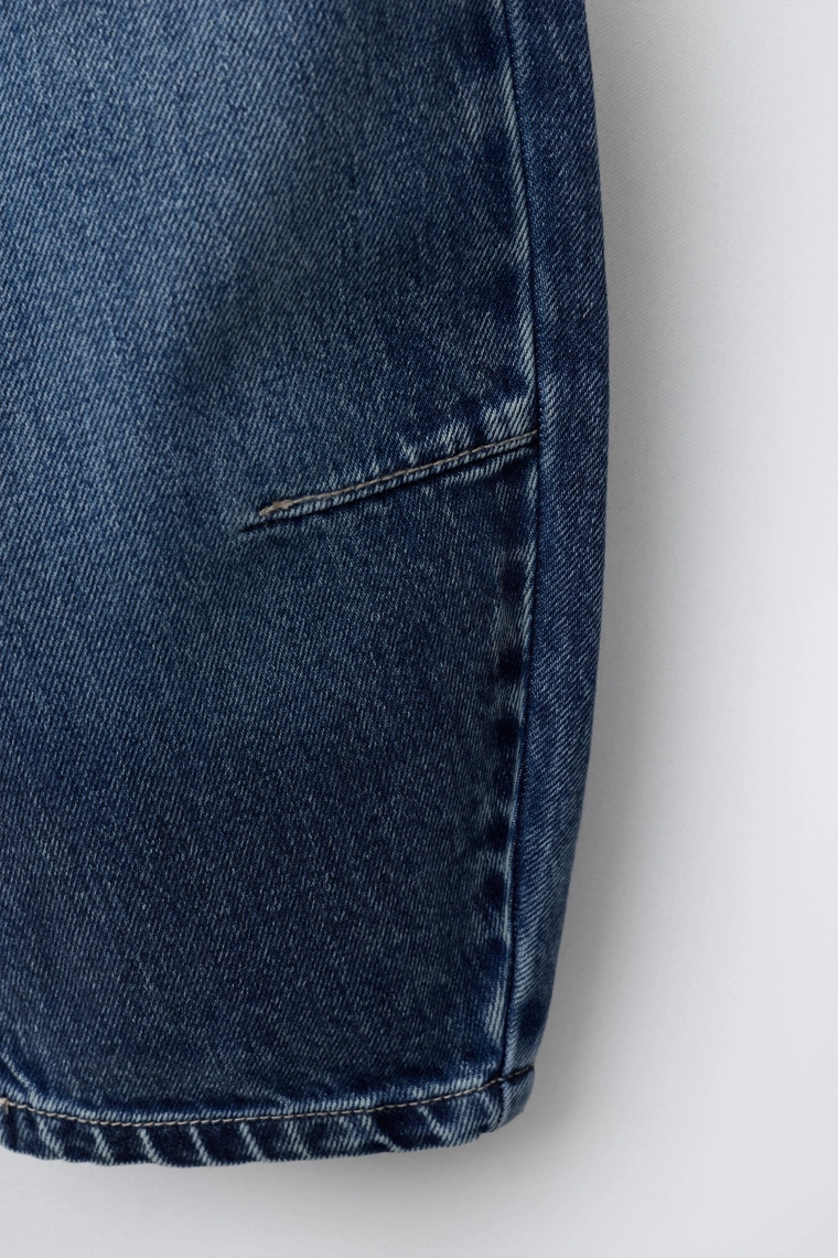 Брюки-бочки с защипами